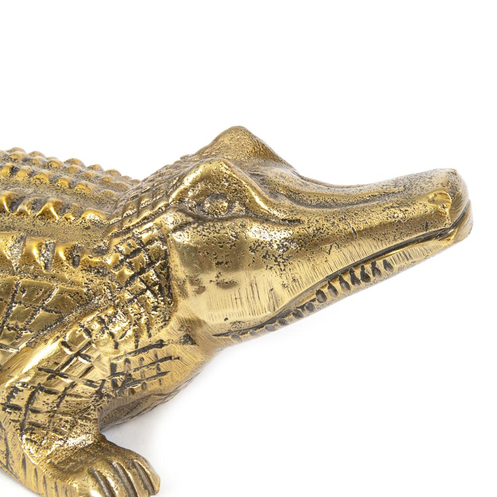 Goldene Buchstütze Krokodil