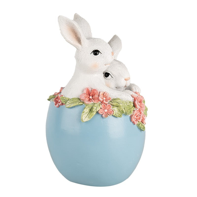 Easter bunnies in blue egg