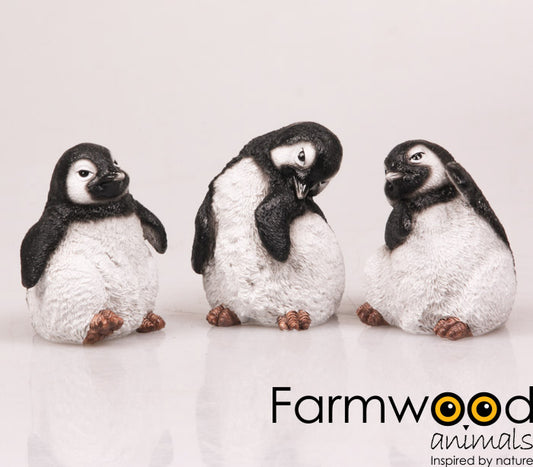 Zwart-wit pinguïn beeldje van polyresin, assorti geleverd