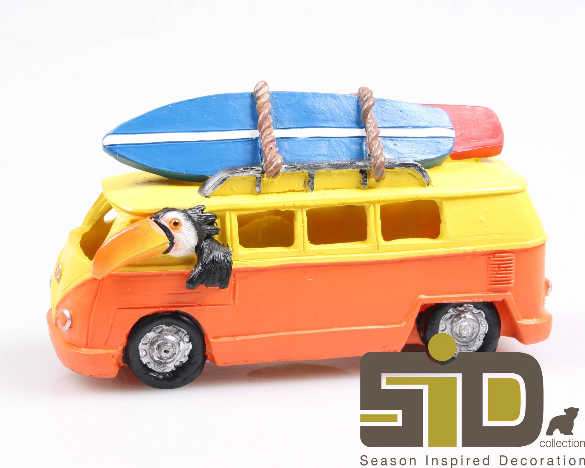 Toekan beeldje in kleurrijke bus – zomerse woondecoratie SID