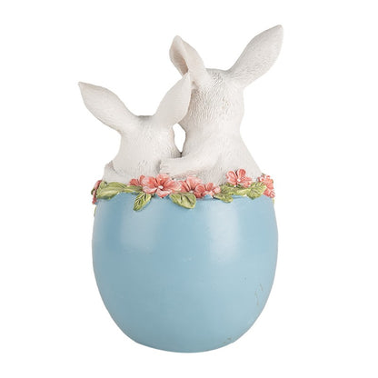 Easter bunnies in blue egg