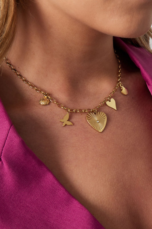 Gouden stainless steel bedelketting met vlinder, hart & strass – 39+5 cm